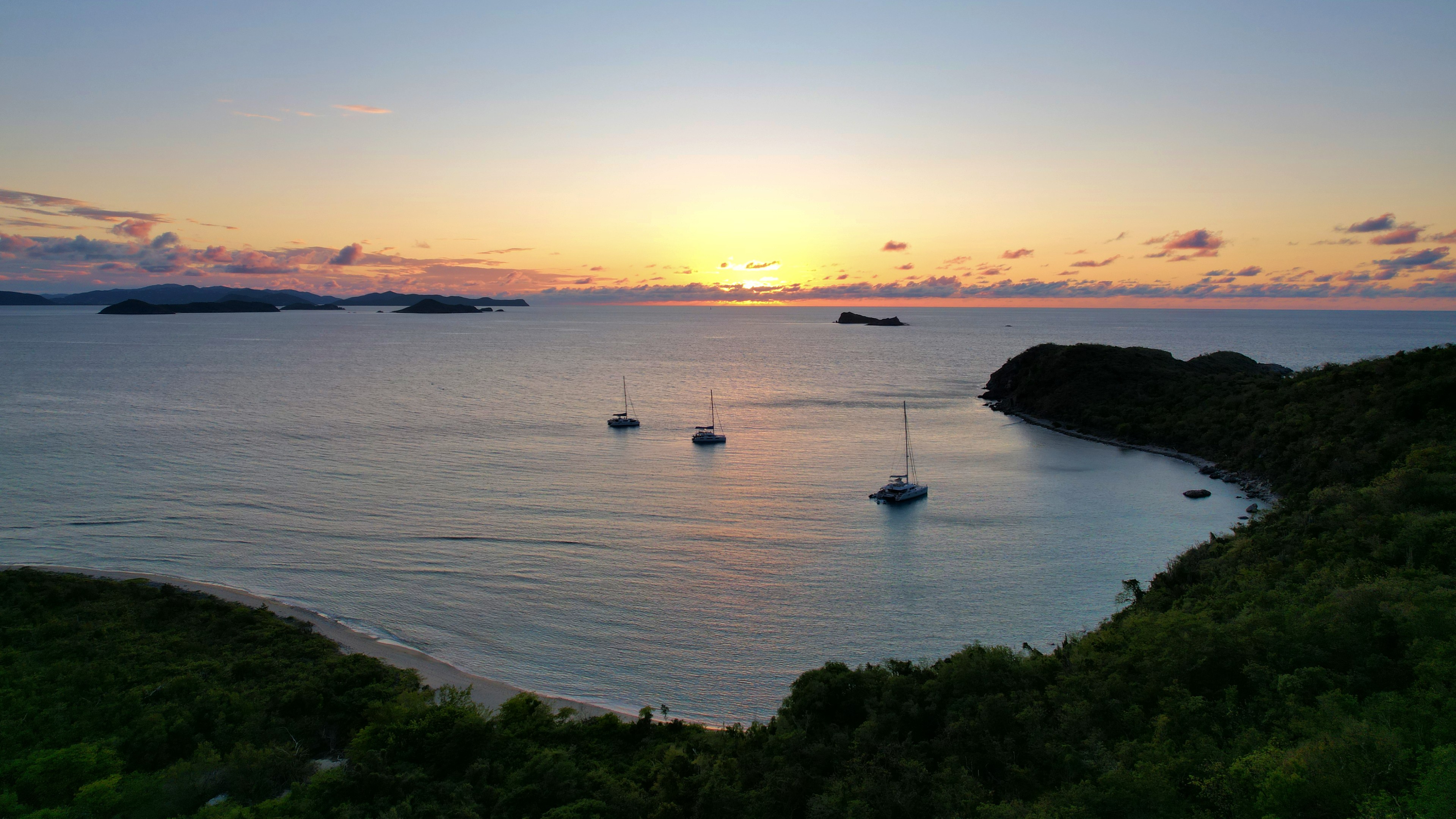 Sunset over sailboats anchored at Long Bay, Virgin Gorda